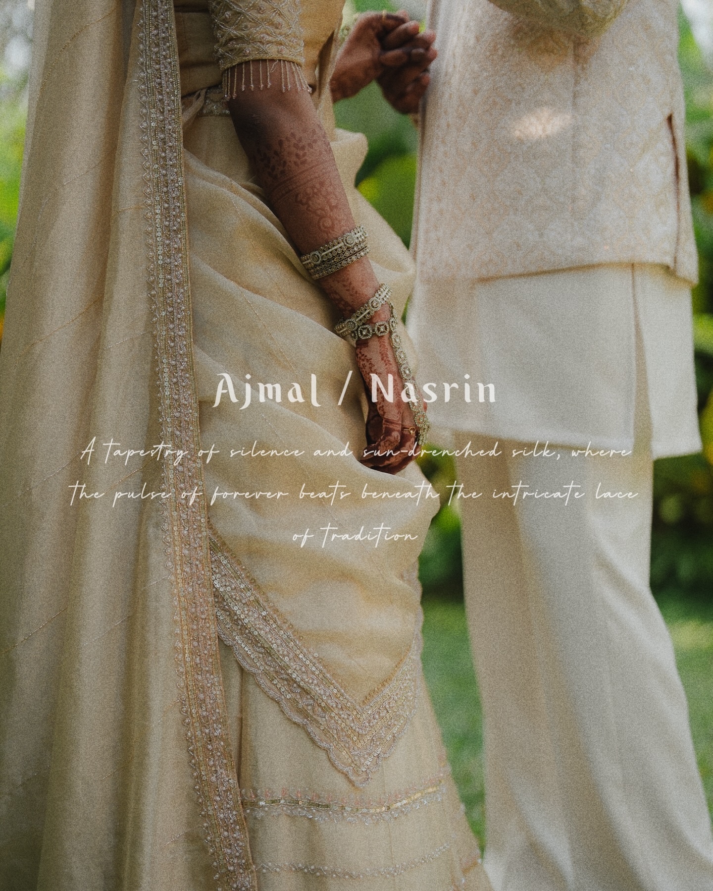 Close portrait of a couple holding hands in ivory wedding attire